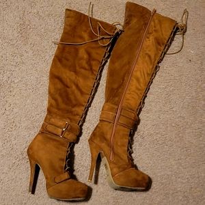 Thigh high lace up front boots